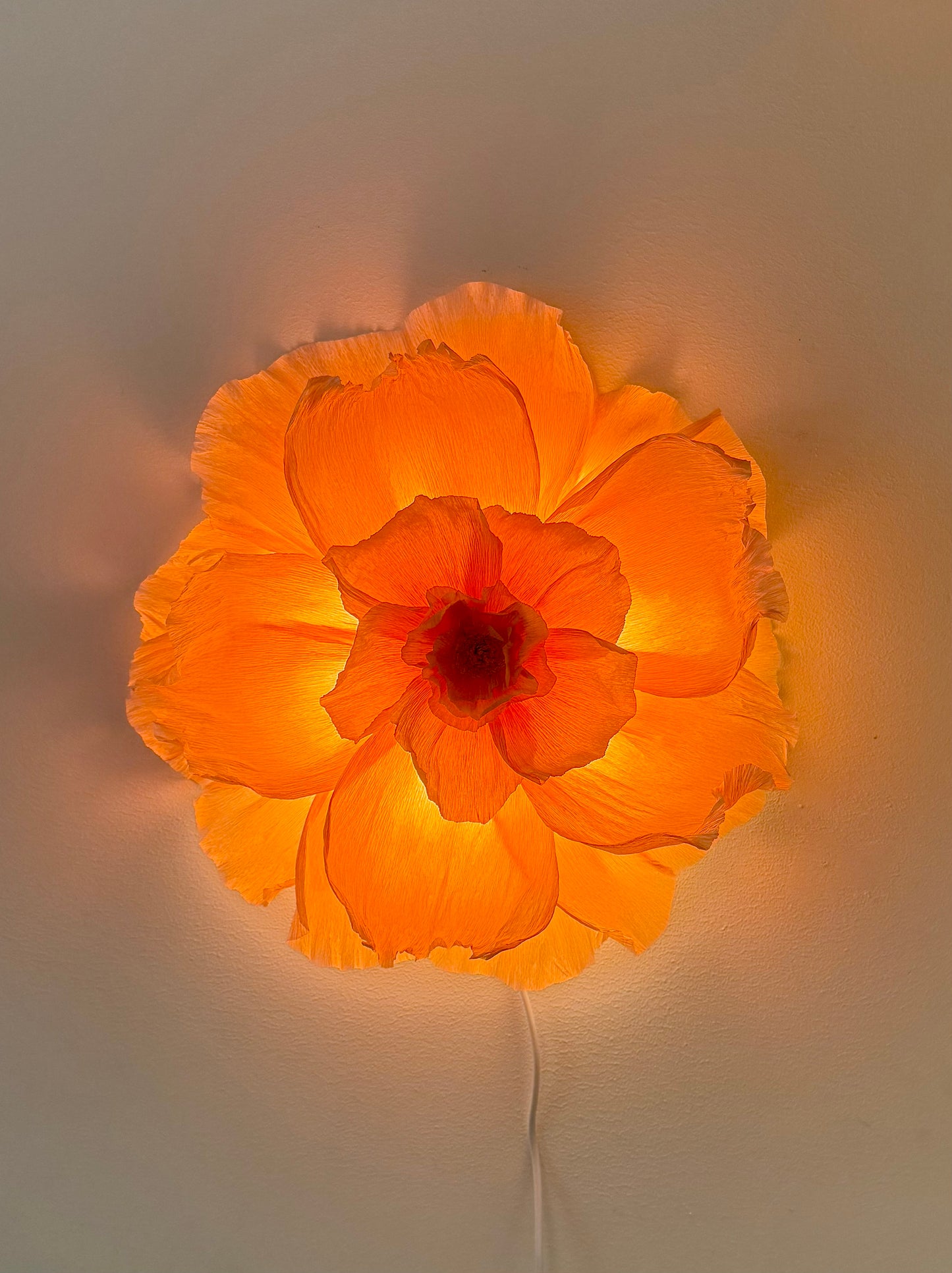 Vägglampan ”Izzie”