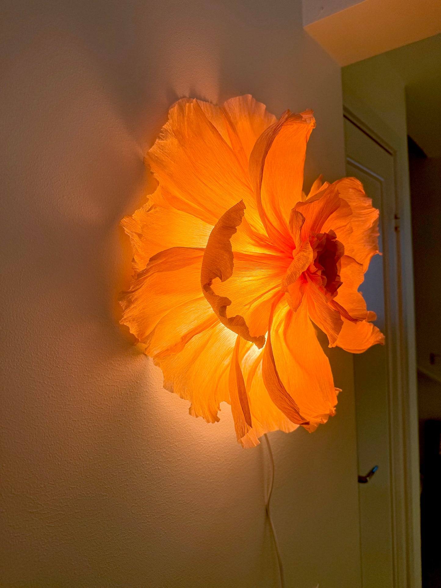 Vägglampan ”Izzie”