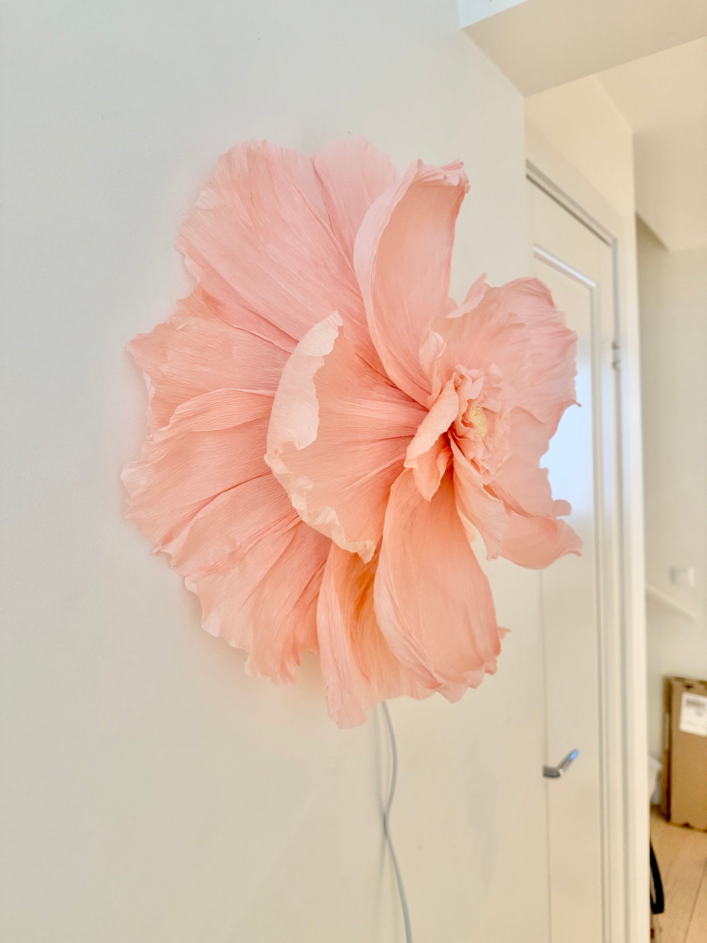 Vägglampan ”Izzie”