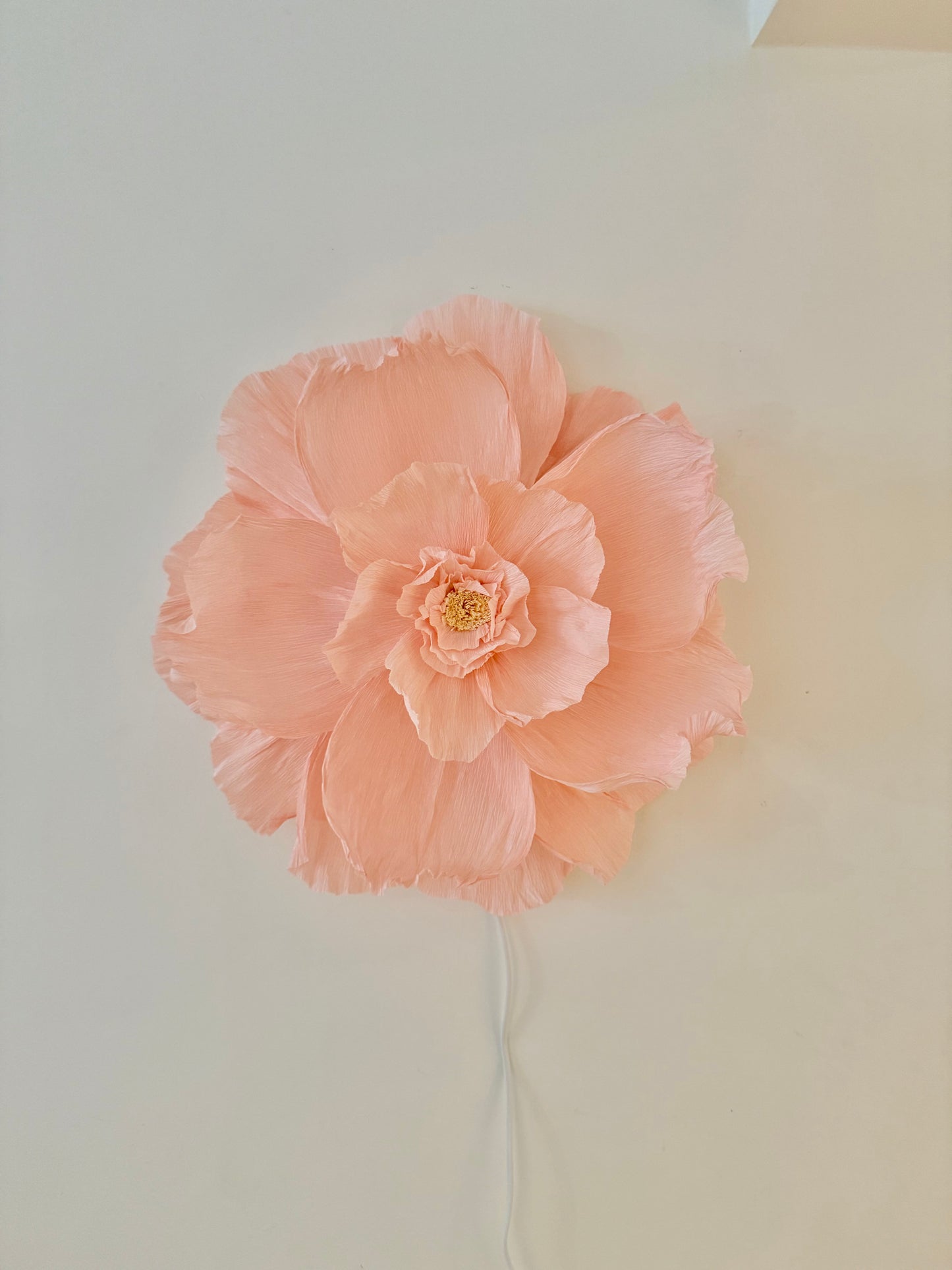 Vägglampan ”Izzie”