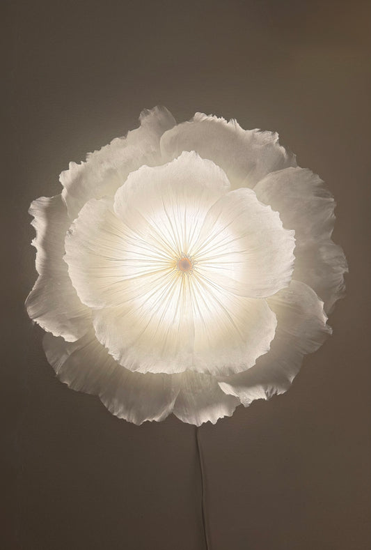 Vägglampan ”Saga”